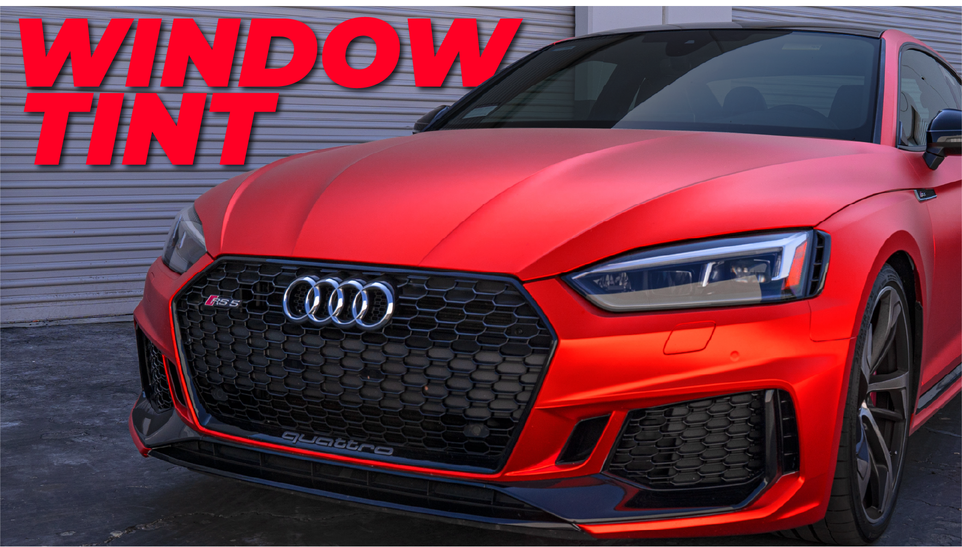 Professional window tinting on red Audi RS5